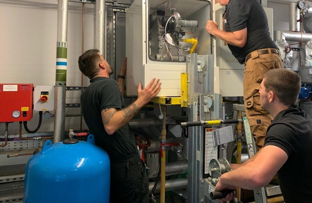 Hydratec team installing a boiler